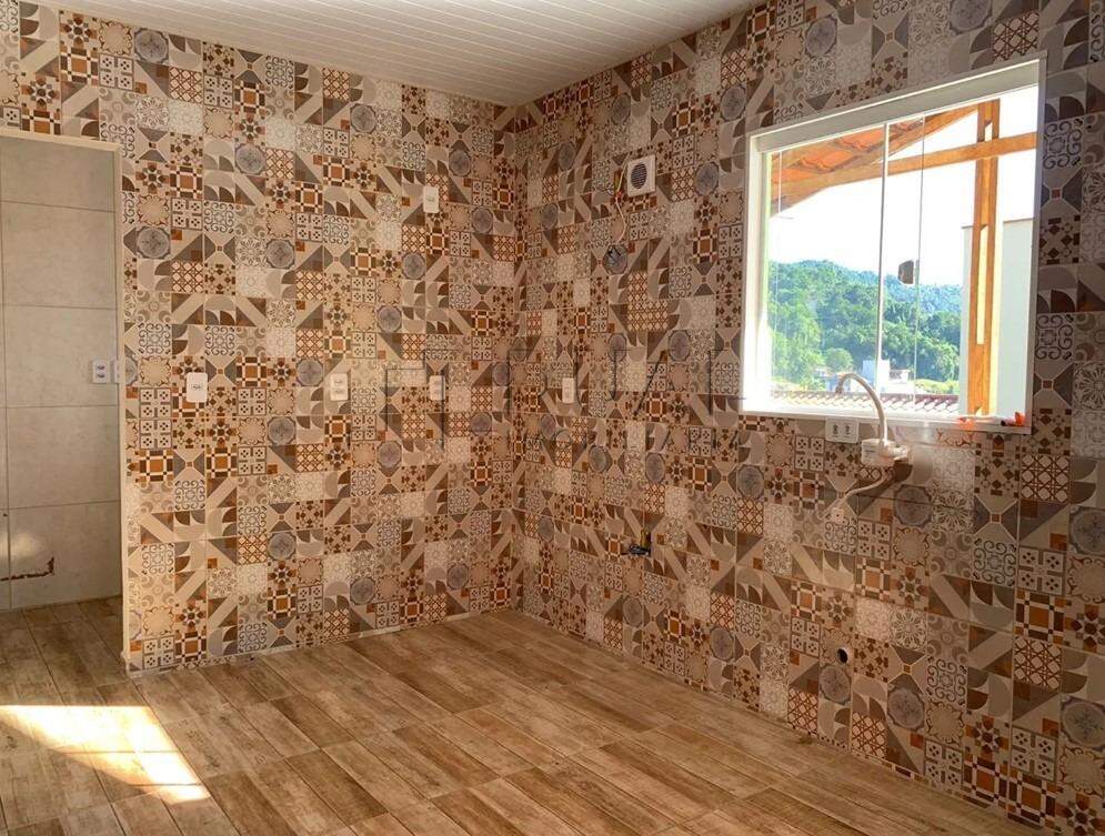 Imagem Terreno com 701,25m² e casa no bairro Vila Nova em Jaraguá do Sul