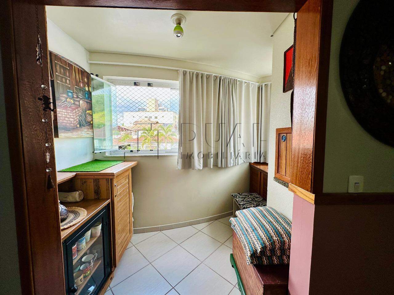 Imagem Apartamento à Venda na Barra do Rio Molha – 2 Quartos e Sacada com Churrasqueira