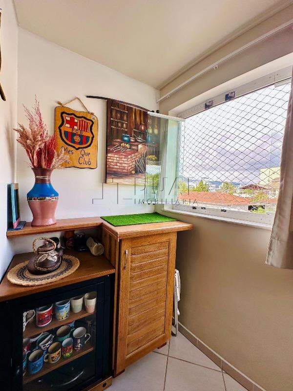 Imagem Apartamento à Venda na Barra do Rio Molha – 2 Quartos e Sacada com Churrasqueira