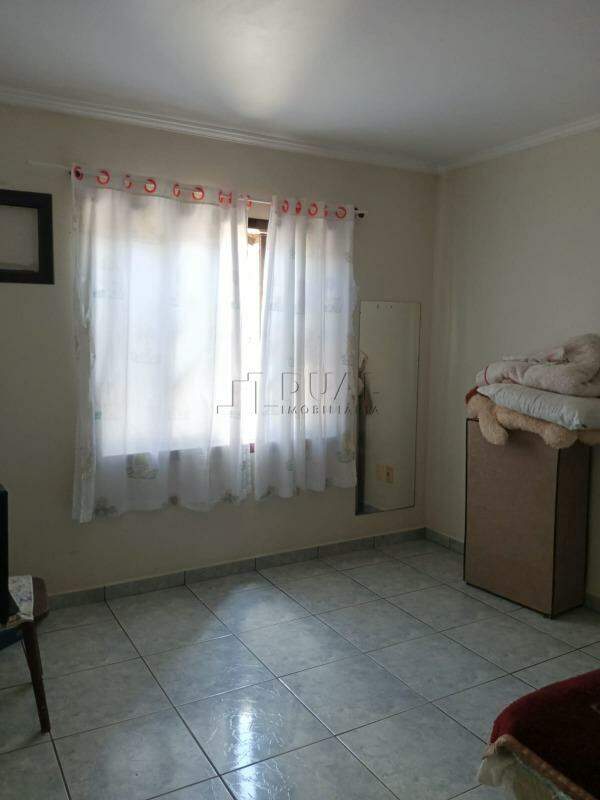 Imagem Sobrado à Venda no Bairro Amizade – 6 Dormitórios, 4 Banheiros e Potencial para Renda Extra