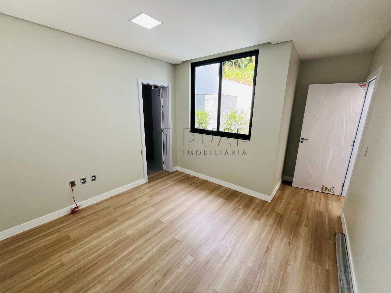 Imagem Casa com 4 suítes no Condomínio Residencial Champs Elysee no bairro Amizade em Jaraguá do Sul - Elysiun Residenz