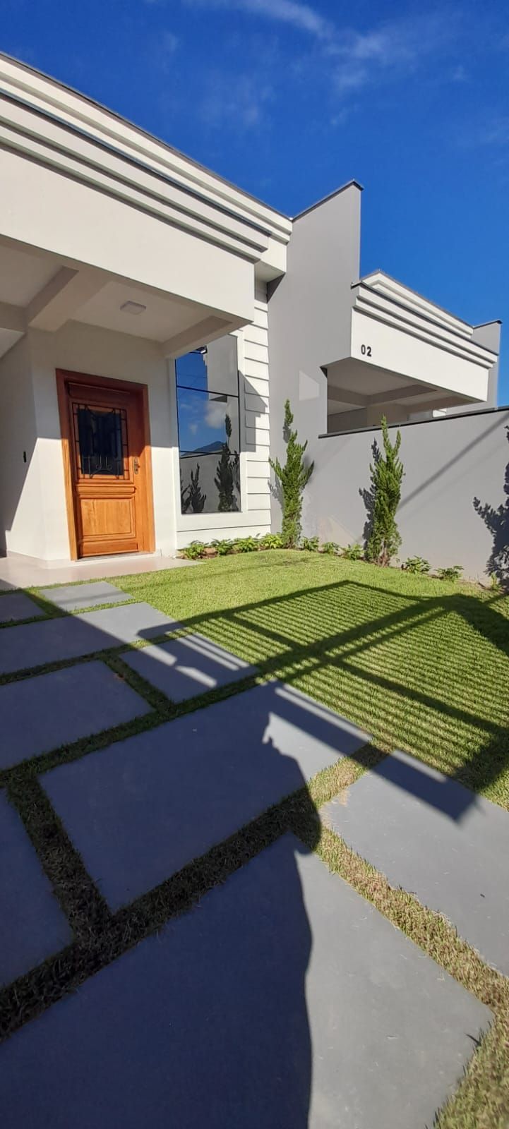 Imagem Geminado no Residencial Lótus com 2 suítes + dormitório e 162,50m² à venda no bairro Barra do rio cerro I em Jaraguá do Sul