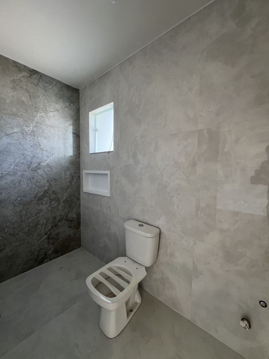 Imagem Linda Casa Geminada com 3 Dormitórios em Localização Privilegiada