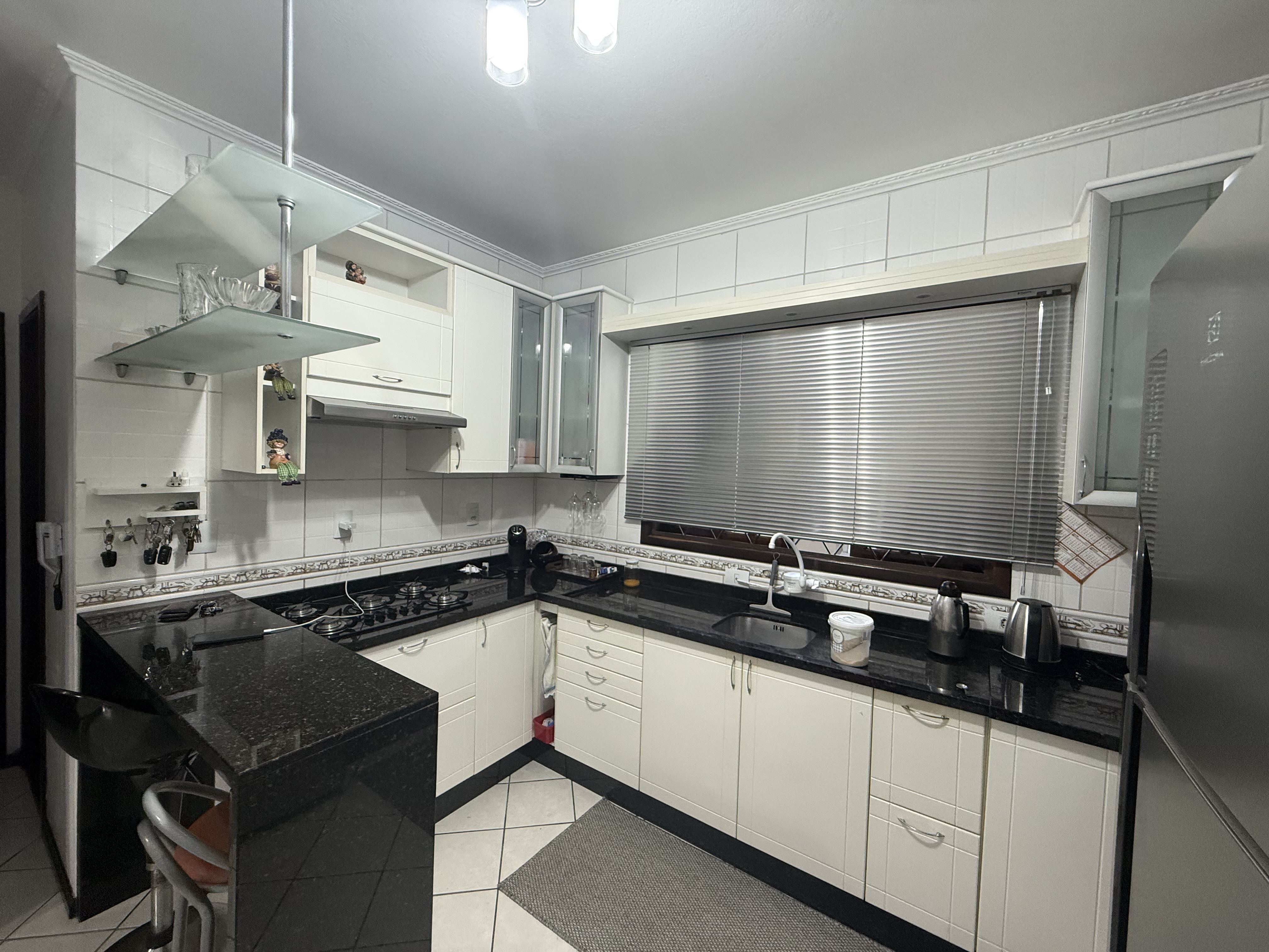 Imagem Terreno 924 m² com 2 casas – Ideal para ponto comercial no bairro Vila Lenzi