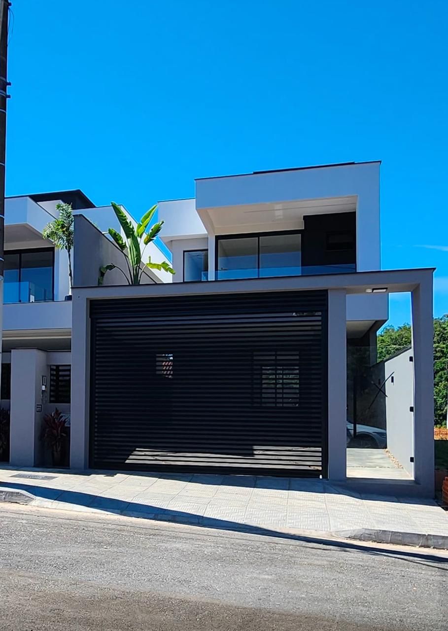 Imagem Geminado Suíte + 2 quartos - 2 vagas de garagem lado a lado.